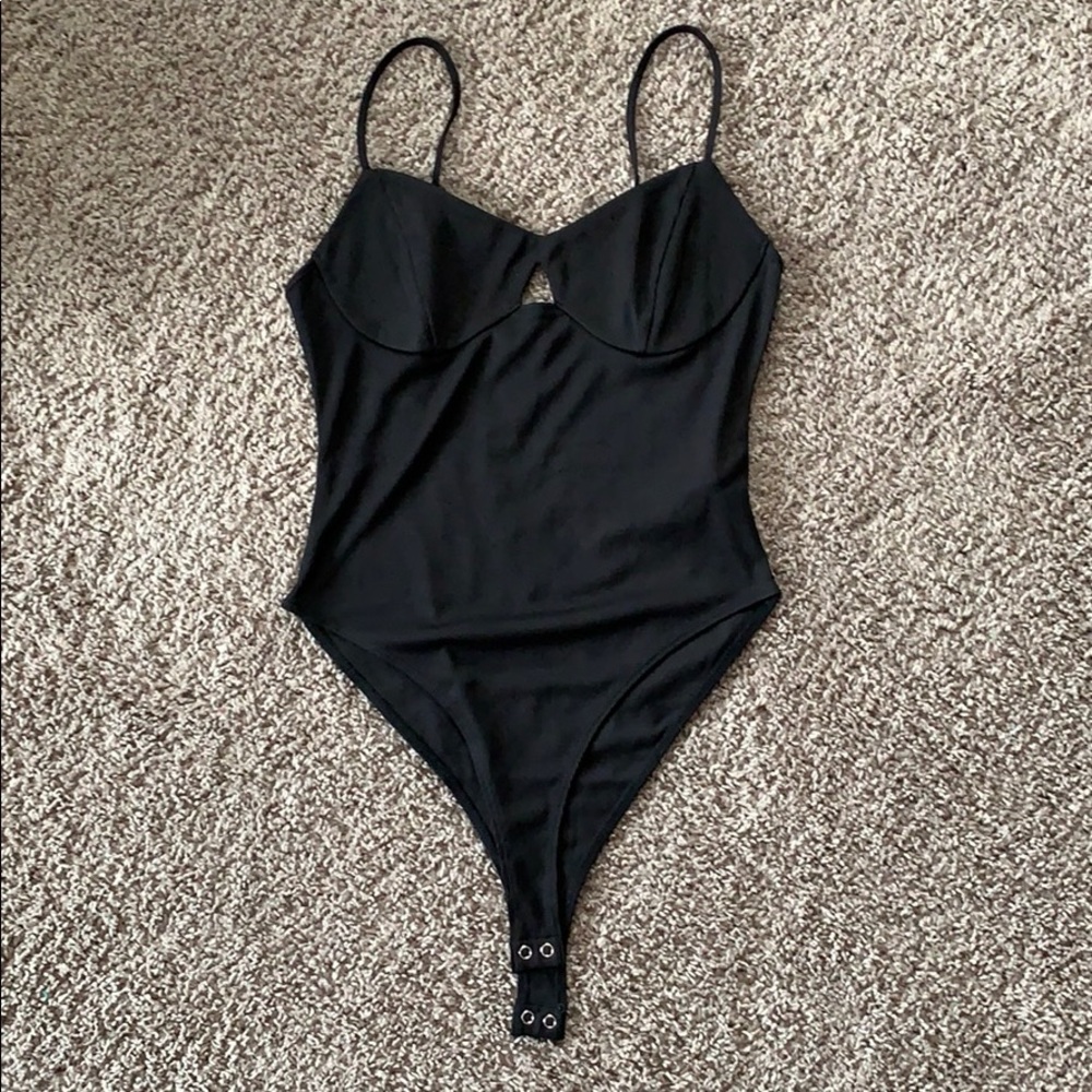 Black ribbed bodysuit. Never worn!